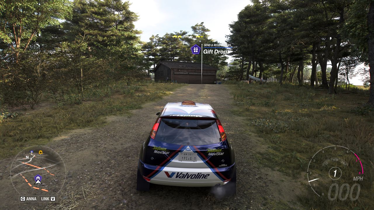 Forza Horizon 6 Barn Finds: A player parked outside an old wooden barn on a wooded hillside.