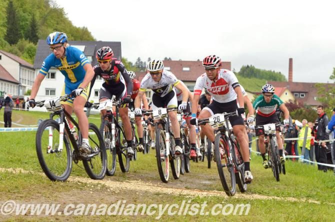 Emil Lindgren (Giant Pro Xc Team) at the front at the start