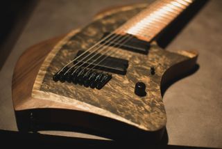 Abasi's design functions as a multi-scale or straight-scale platform with a comfortable neck profile, even for players who are new to extended-range and multi-scale guitars.