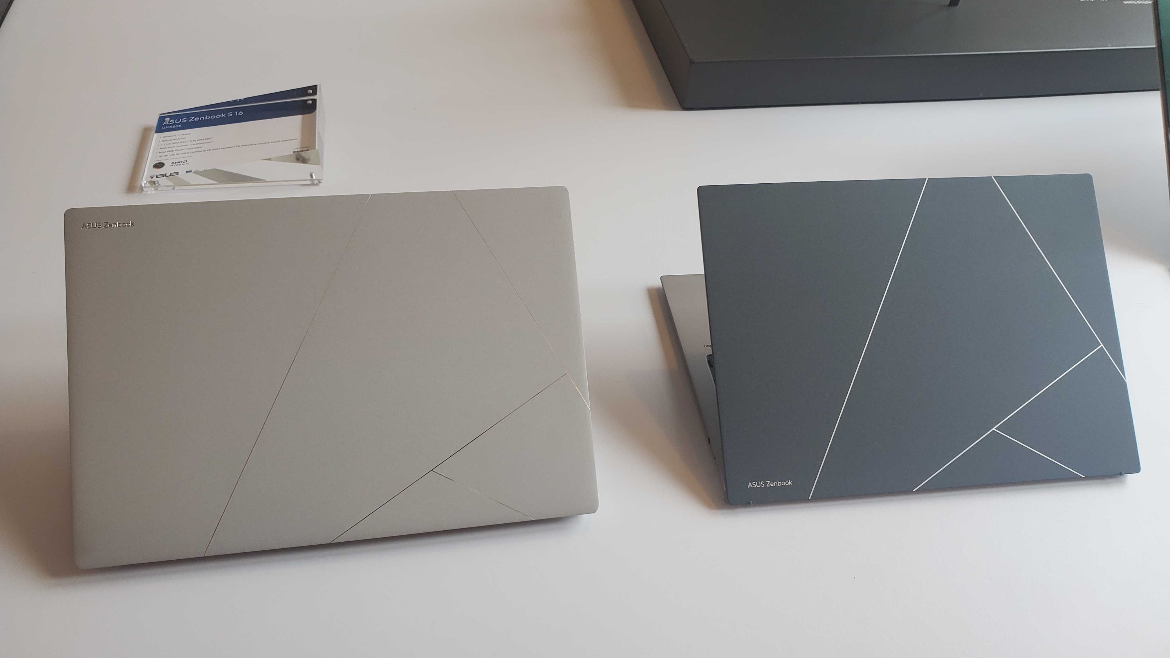 light silver and grey laptops on table