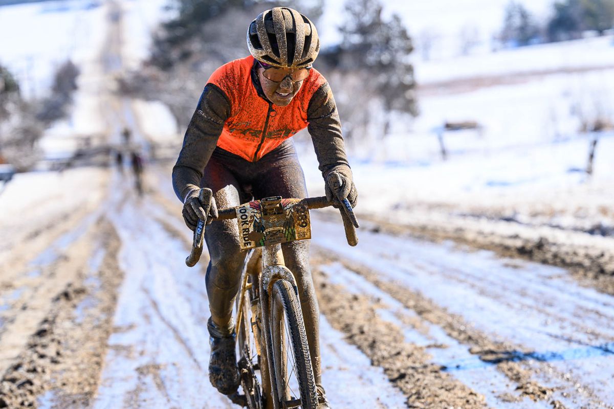 Maddie Munro battles the mud as she rides for the win on the long route