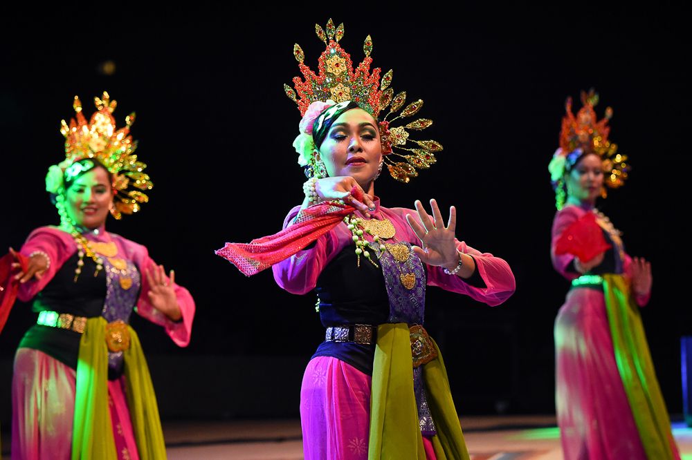 Dancers entertain the crowd at the Tour de Langkawi team presentation
