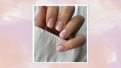 Image of hand curled wearing the Ice Cream Manicure, a soft pink base and ombre white tip, on a pink and purple watercolour background