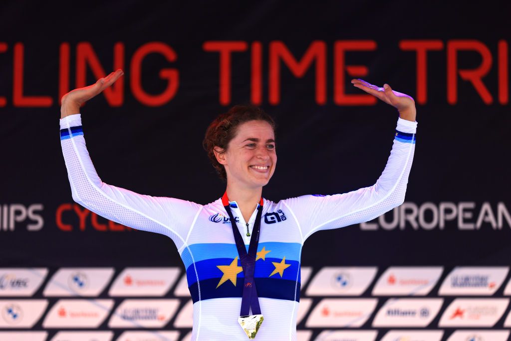 FRSTENFELDBRUCK GERMANY AUGUST 17 Gold medalist Marlen Reusser of Switzerland celebrates winning during the medal ceremony after the 28th UEC Road Cycling European Championships 2022 Womens Individual Time Trial a 24km one day race from Frstenfeldbruck to Frstenfeldbruck on August 17 2022 in Frstenfeldbruck Germany Photo by Jan HetfleischGetty Images