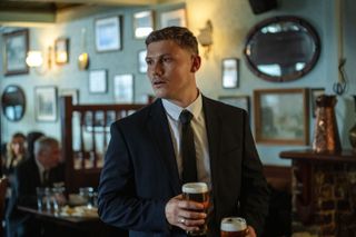 Jon Pointing as Craig at rhiannon's father's funeral in sweetpea