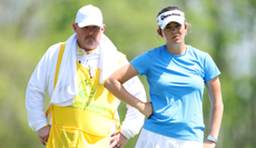 Asterisk Talley and her caddie Ryan Zak at Augusta National Women's Amateur