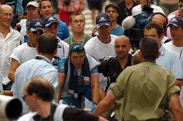 Pierrick Fedrigo (Bouygues) is escorted to the podium