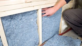 cotton/denim insulation being installed