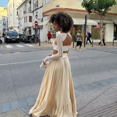 Influencer wears a boho skirt.