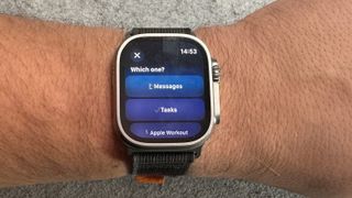An Apple Watch on a wrist showing the Action Button shortcuts menu