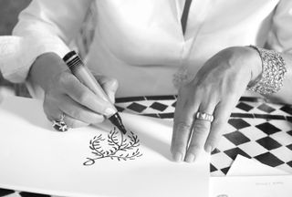 Paloma Picasso sketching one of her Olive Leaf designs for Tiffany & Co.