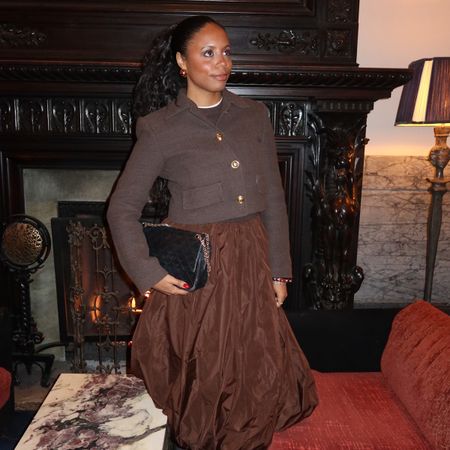 sierra mayhew wearing an aritzia jacket