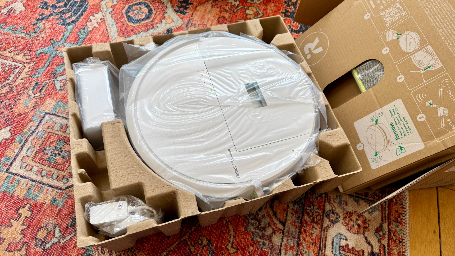 iRobot Roomba 205 DustCompactor Combo robot vacuum in its box