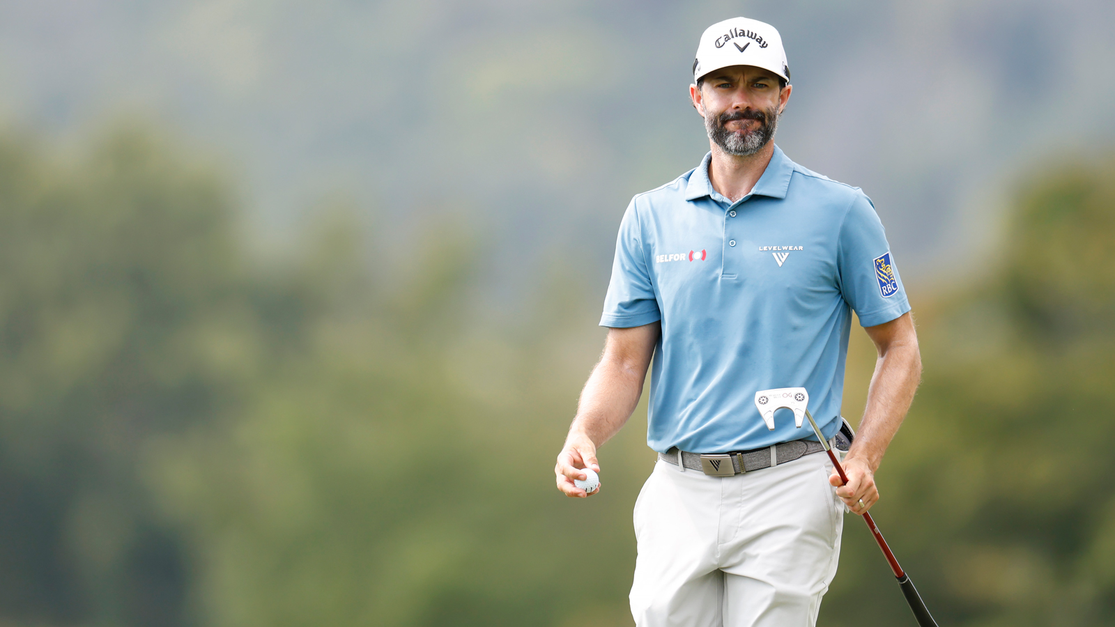 Adam Hadwin walks off the green