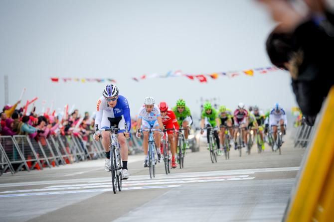 Riders contending with the wind