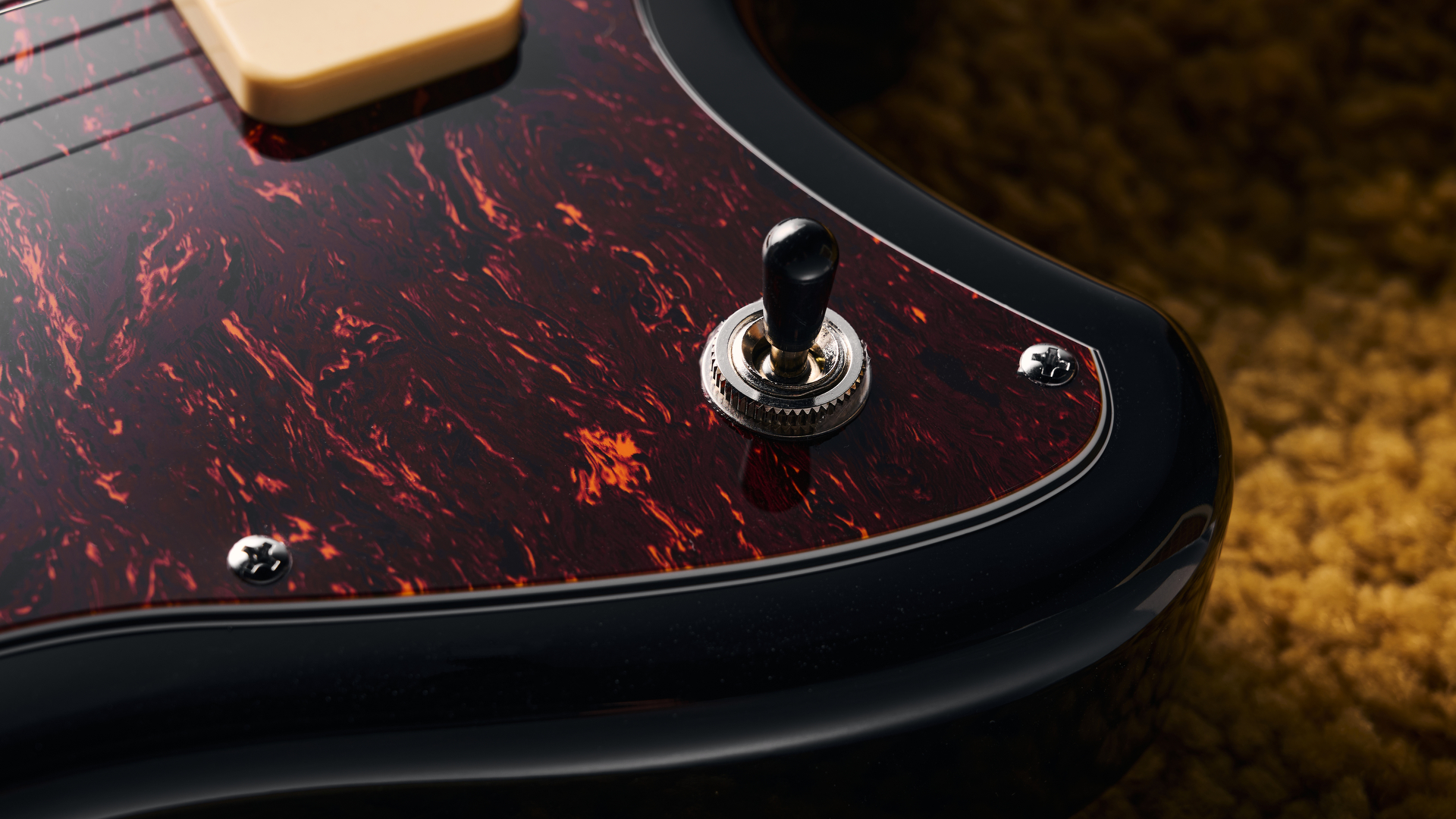 Close up of the pickup toggle switch on an Orangewood Del Sol Baritone guitar