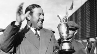 Bobby Locke celebrates after winning The Open Championship at Lytham Saint Anne's in 1952