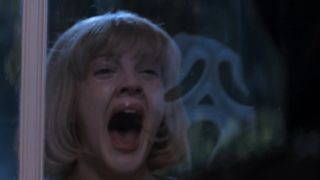 Drew Barrymore as Casey Becker scared by Ghostface in Scream