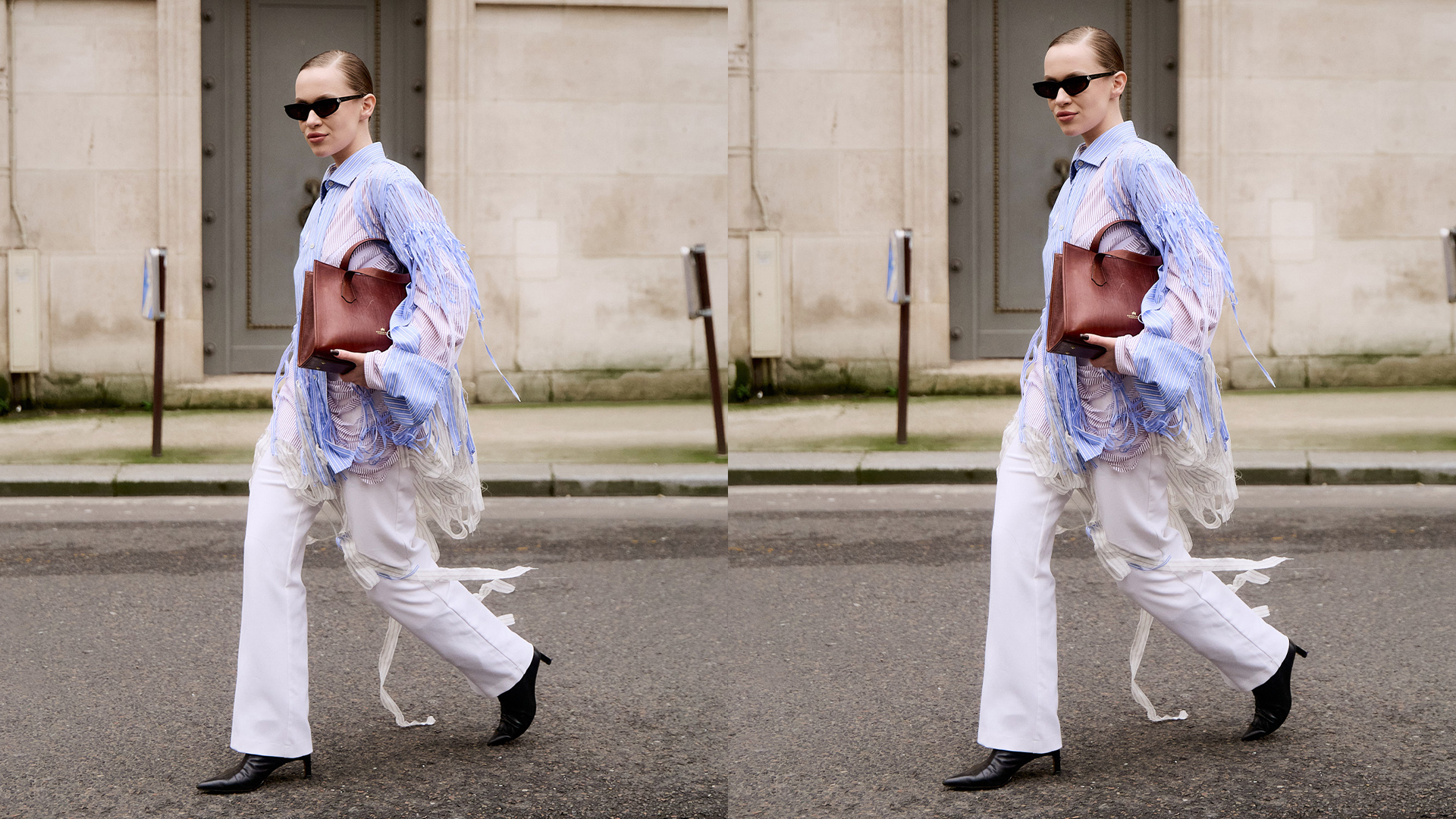 Woman wears distressed blue button down white jeans and black boots while carrying a brown ntote bag