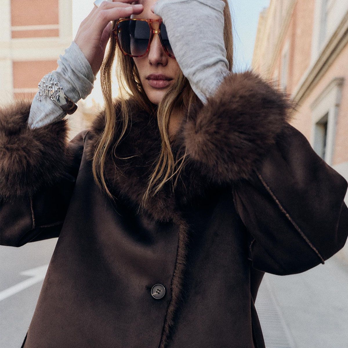 woman in faux fur lined Zara jacket