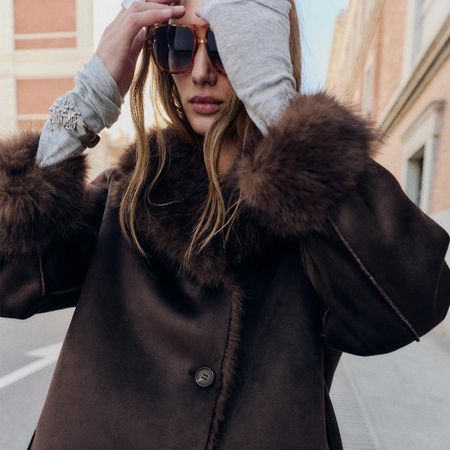 woman in faux fur lined Zara jacket