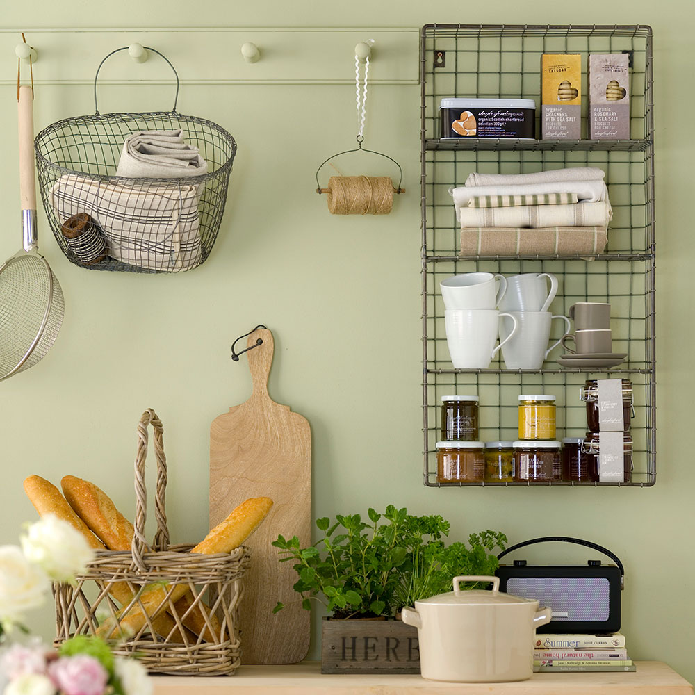 kitchen with green walls cup of tea and towels