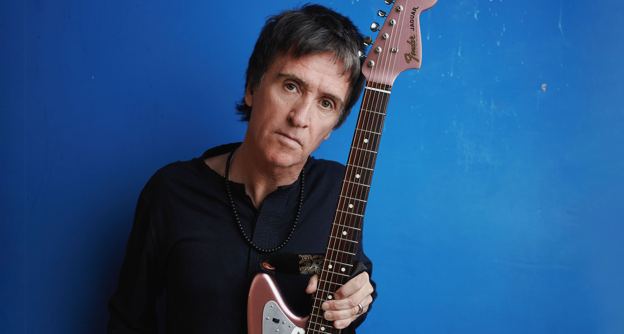 Johnny Marr pictured with one of his many Fender Jaguars.