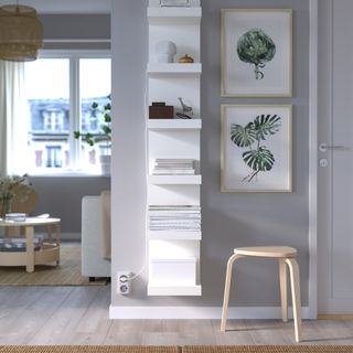 Wall shelving unit in room