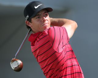 Rory McIlroy using a persimmon club during a practice day for the BMW Championship at the Cherry Hills Country Club in 2014