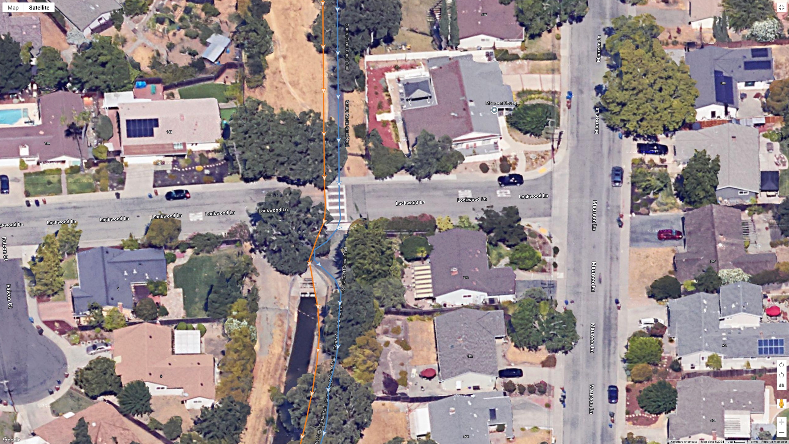 A Google Earth satellite image showing a runner's location data, comparing the COROS PACE Pro (orange) and Garmin Fenix 8 (blue) for multi-band GPS accuracy.