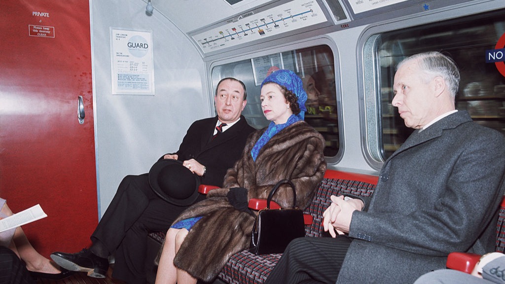 The Queen travelling on the London Underground after officially opening the Victoria Line service