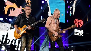 Vivian Campbell (left) and Phil Collen of Def Leppard perform onstage at the 2019 iHeartRadio Music Festival at the T-Mobile Arena on September 21, 2019 in Las Vegas, Nevada