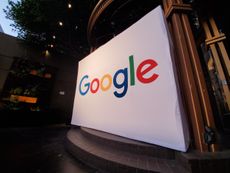The Google search logo on a large sign on a stage