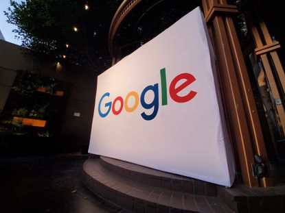 The Google search logo on a large sign on a stage