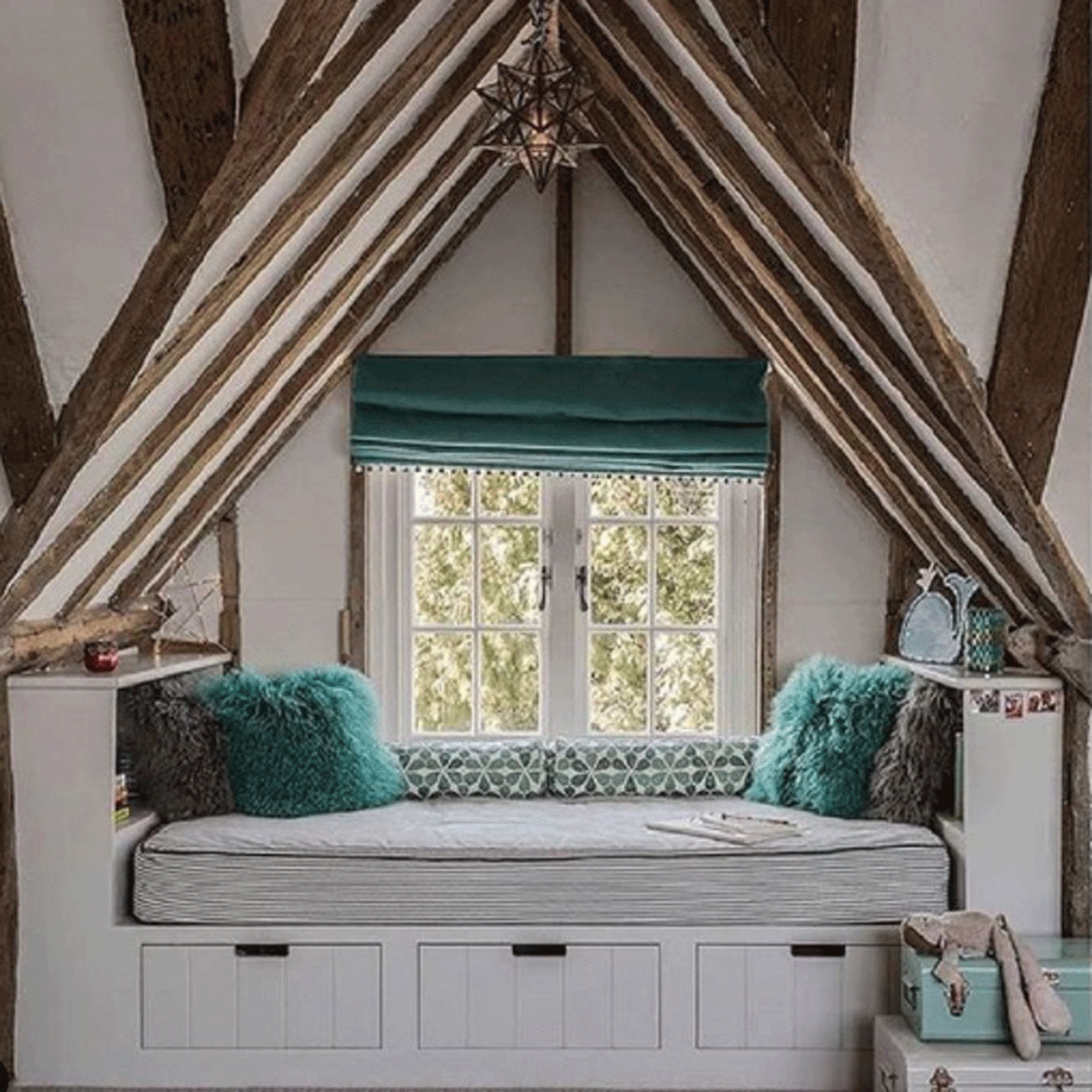 Neutral attic bedroom with teal accessories