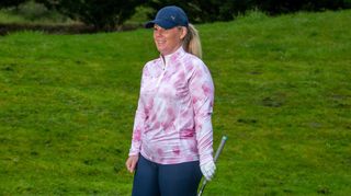 Puma Womens You-V Cloud 1/4 Zip Mid-Layer worn on the golf course