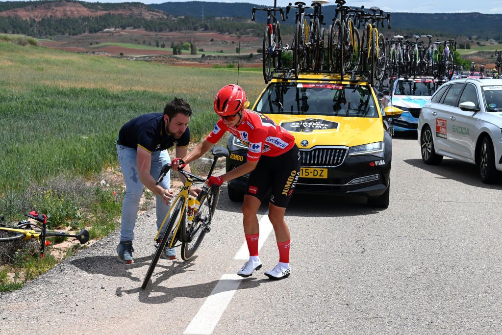 GUADALAJARA SPAIN MAY 04 Marianne Vos of The Netherlands and Team JumboVisma Red Leader Jersey assisted by the team car due to a mechanical problem during the 9th La Vuelta Femenina 2023 Stage 4 a 1331km stage from Cuenca to Guadalajara UCIWWT on May 04 2023 in Guadalajara Spain Photo by Dario BelingheriGetty Images