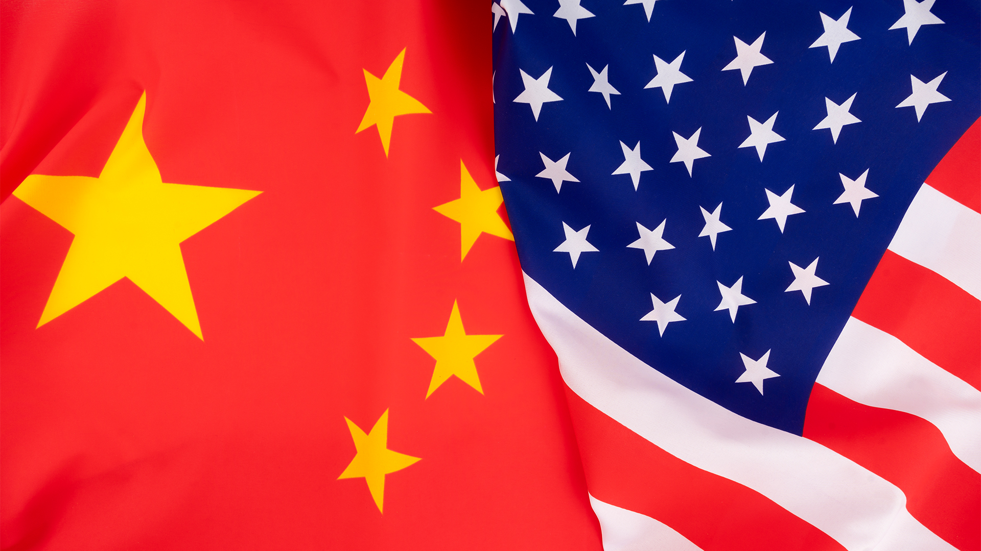 The flag of the People's Republic of China (PRC) and United States pictured side-by-side.