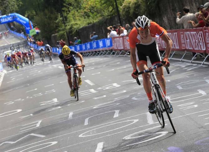 Mathieu van der Poel (Netherlands) drops Franck Bonnamour (France) on Via Salviati en route to victory in the junior men's road race at the world championships.