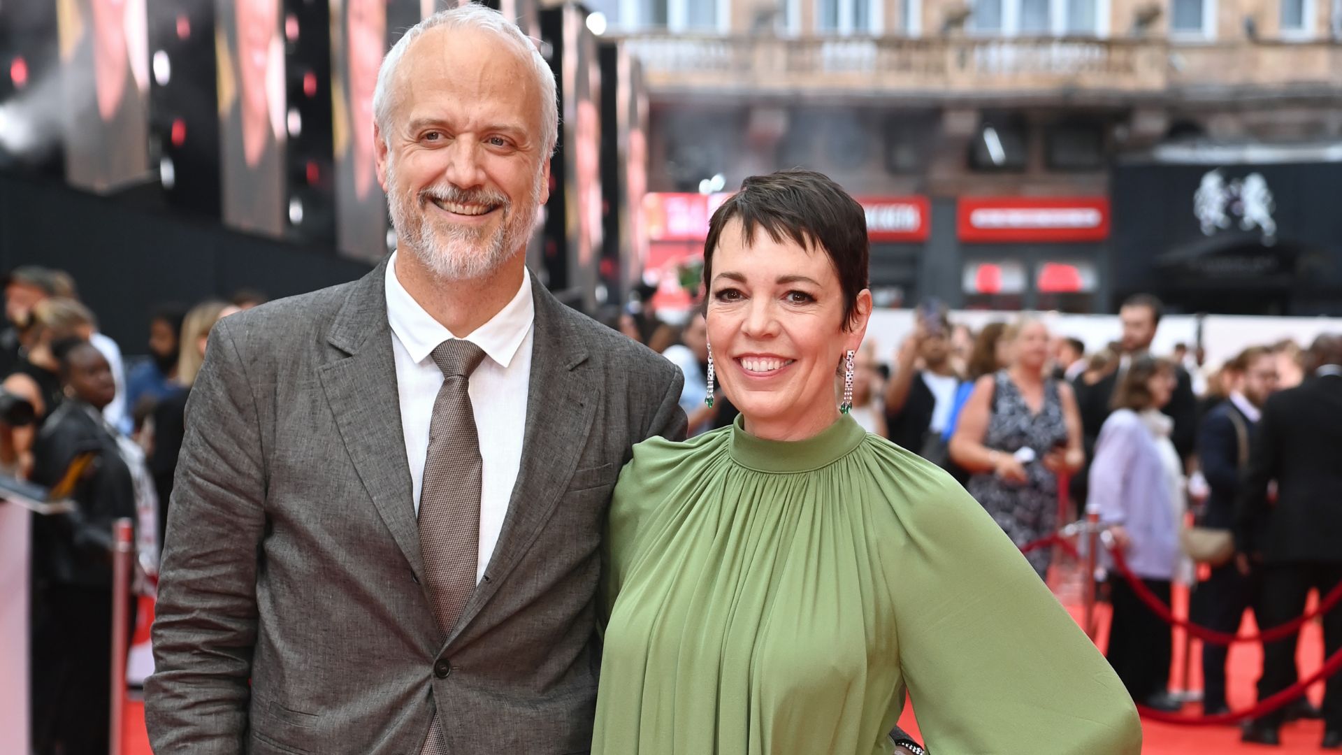 Ed Sinclair and Olivia Colman attend the UK Premiere of The Roses at Odeon Luxe Leicester Square on August 28, 2025