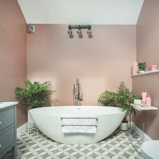pink bathroom with egg bath