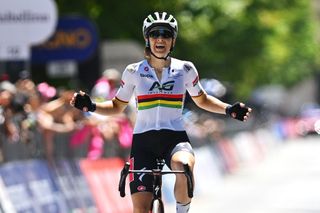 Kimberley Le Court of Mauritius and AG Insurance-Soudal Team celebrates at finish line as stage 8 winner at the 2024 Giro d'Italia Women