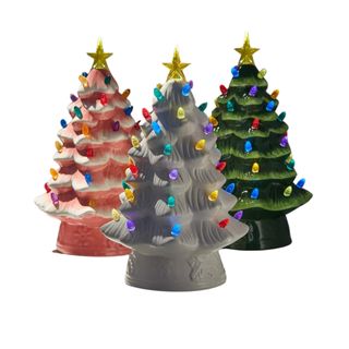 Three vintage ceramic Christmas trees with lights