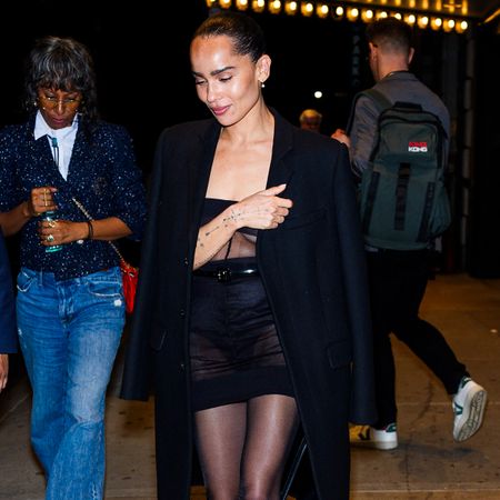 Zoe Kravitz attends Cabaret at the KitKat Club on April 16, 2024 in New York City wearing a black blazer and sheer dress, sheer tights, and black heels.