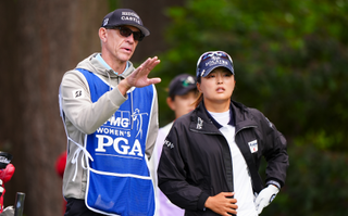 Jin Young Ko and her caddie in conversation