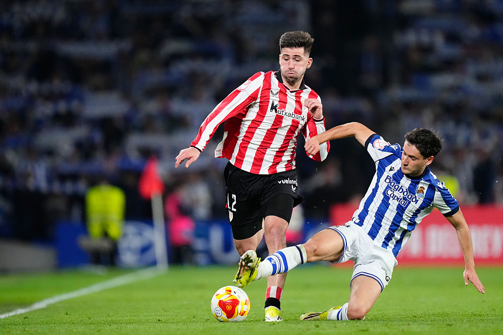 Jesus Areso right-back of Athletic Club and Spain and Jon Gorrotxategi defensive midfield of Real Sociedad and Spain compete for the ball during the second leg of the Copa del Rey semi-final between Real Sociedad and Athletic Club at Estadio Anoeta on March 4, 2026 in San Sebastian, Spain.