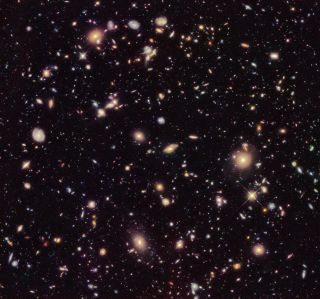 This image shows an improved version of the Hubble Ultra Deep Field from 2012 as seen by the Hubble Space Telescope.
