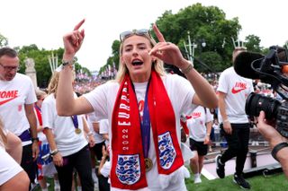 Chloe Kelly celebrates England's 2025 Euros triumph