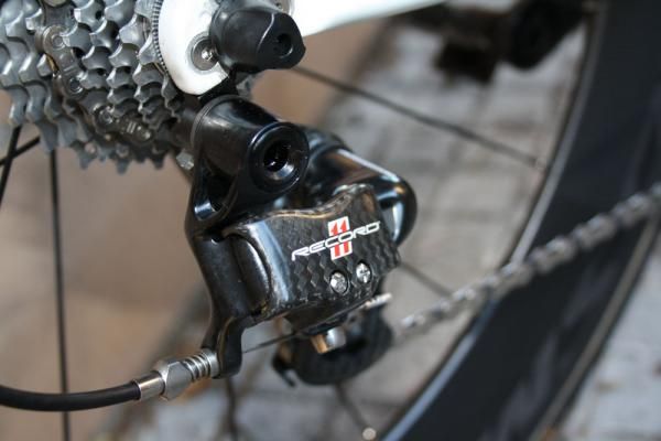 Campagnolo's Record 11 rear derailleur uses aluminum knuckles instead of the carbon ones on the Super Record model.