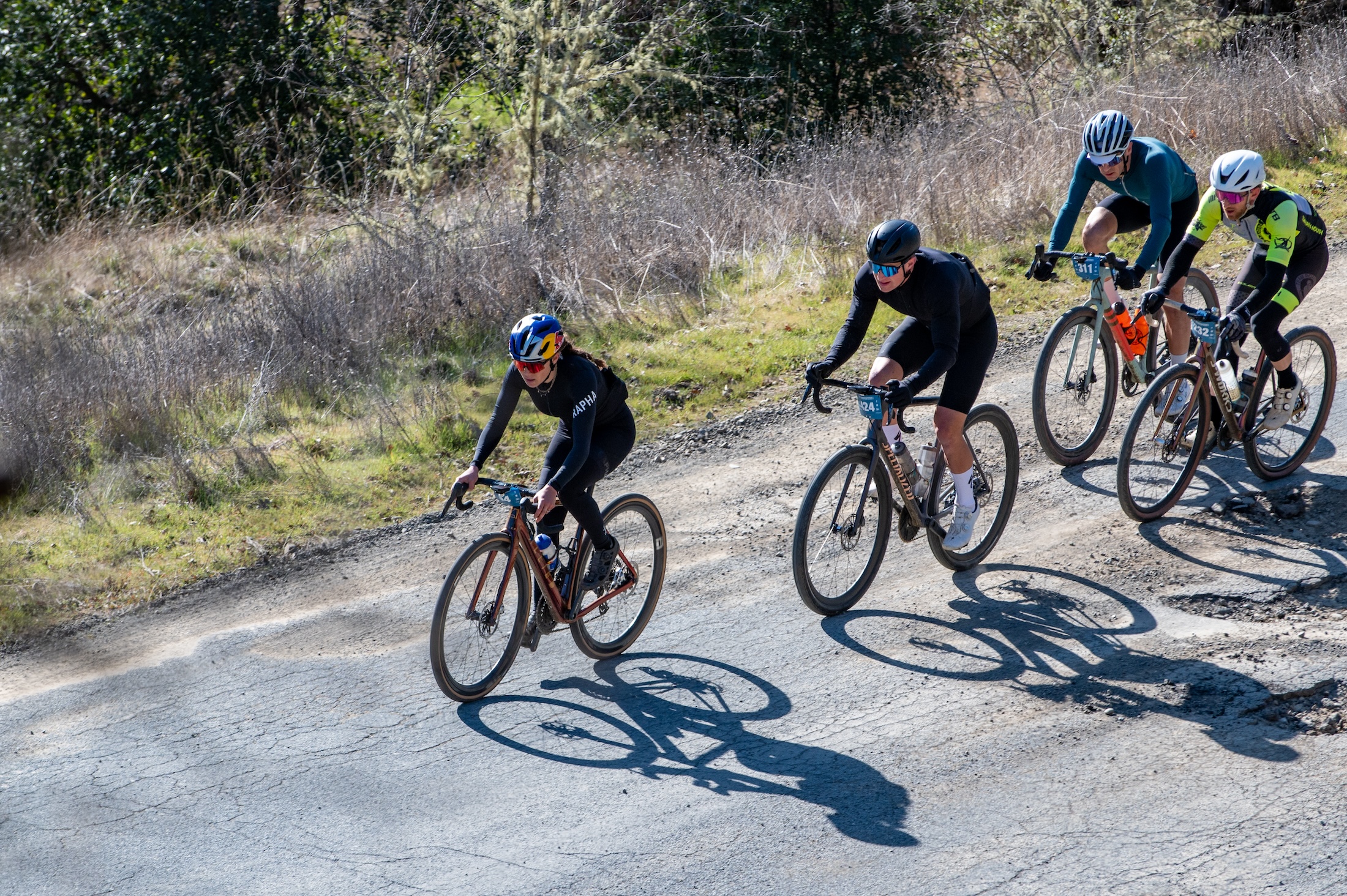 Kate Courtney leads a pack of riders across Mendocino County course